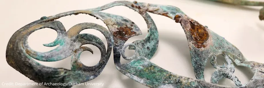 Close up of an ornate piece of metalwork.