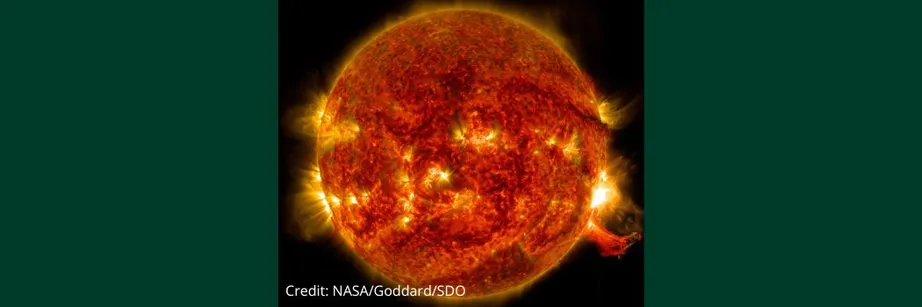 A close up image of the Sun which is orange against a black background. There are bright flares escaping from the Sun's surface.