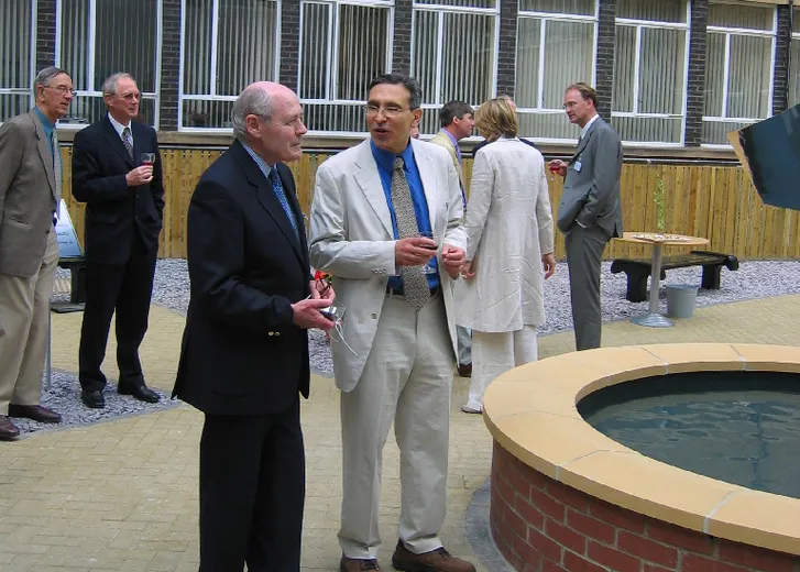 Carlos Frenk with sculptor John Robinson