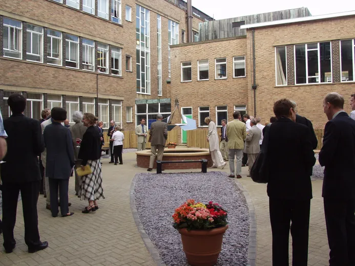 Gathering of people for the Sculpture unveiling