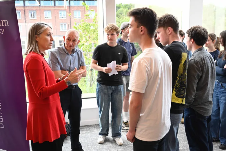 Dr Fiona Hill with students after the Chancellor in Conversation event
