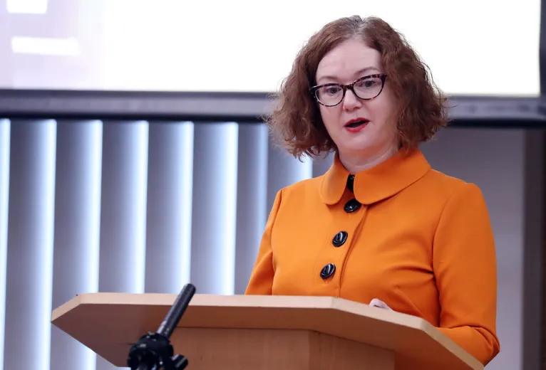 Professor speaking in front of an audience